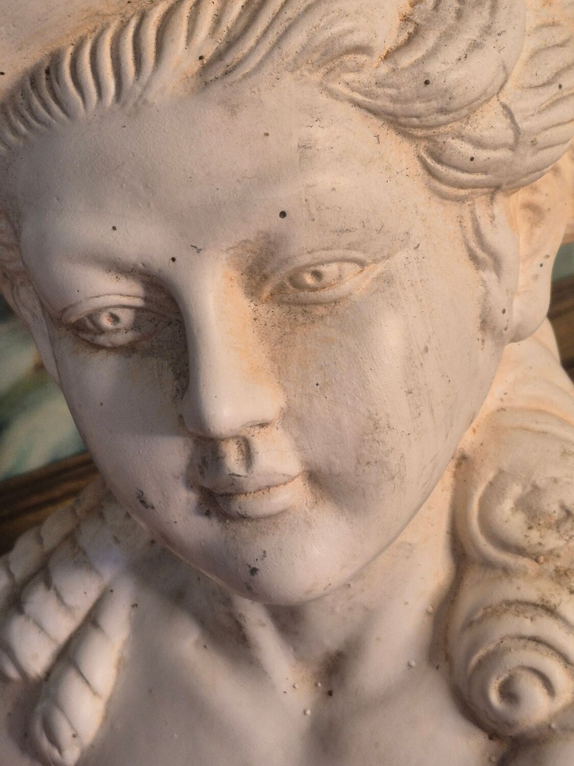 Bust of a woman with a hat