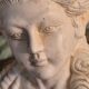 Bust of a woman with a hat