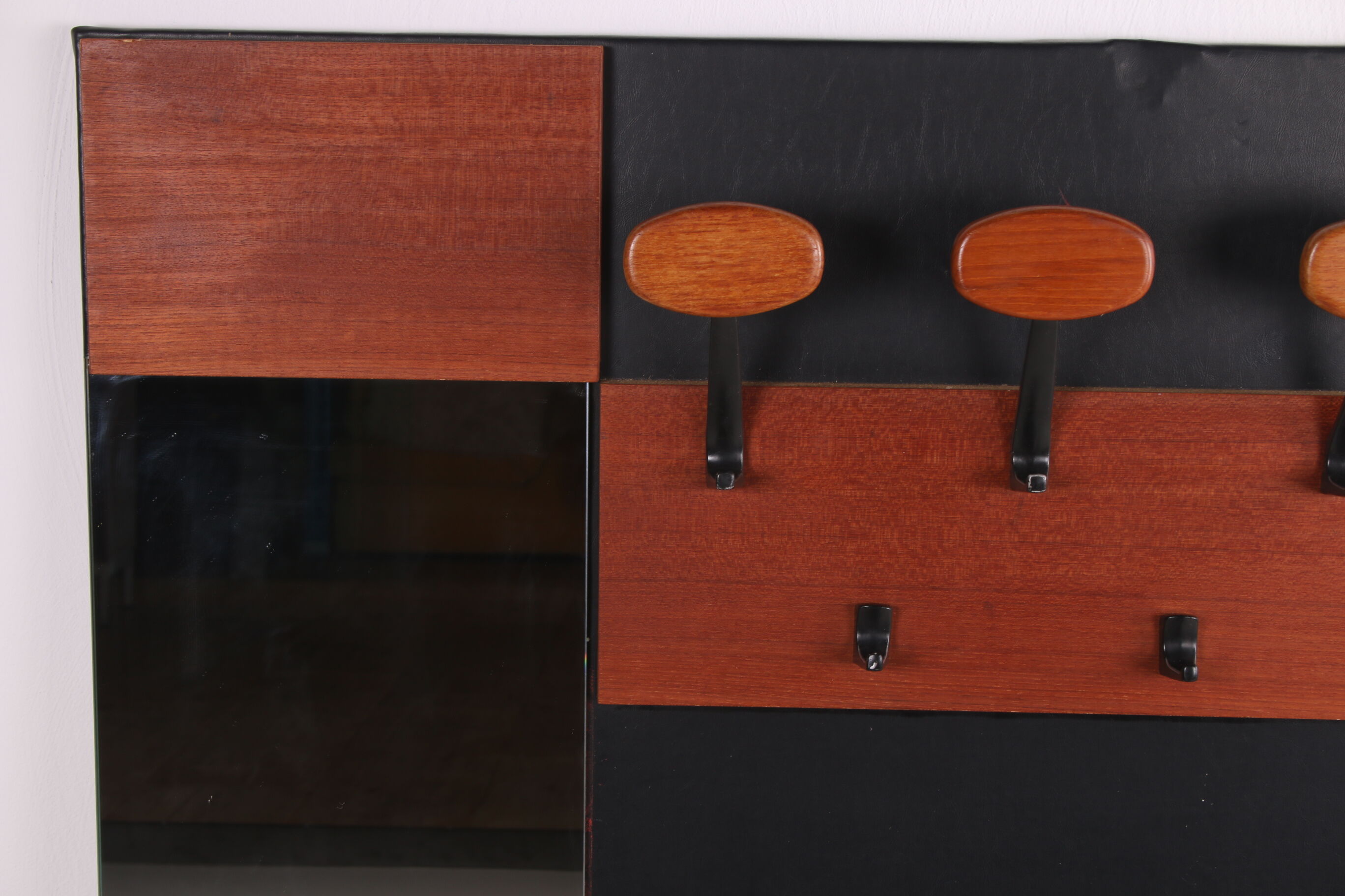 Vintage wardrobe with mirror and hooks from the 60s