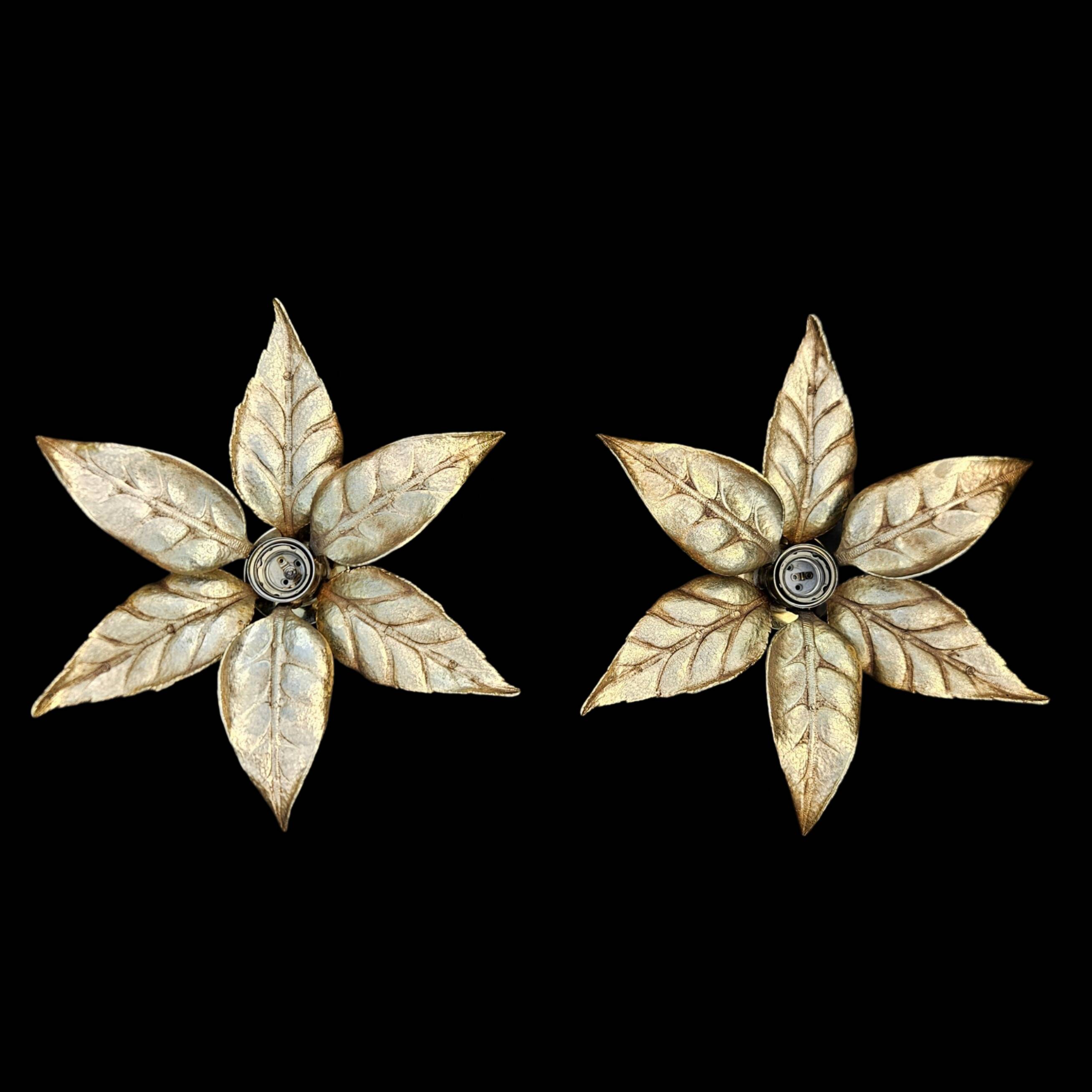 Pair of Massive wall lamps, designed by Willy Daro. 70s