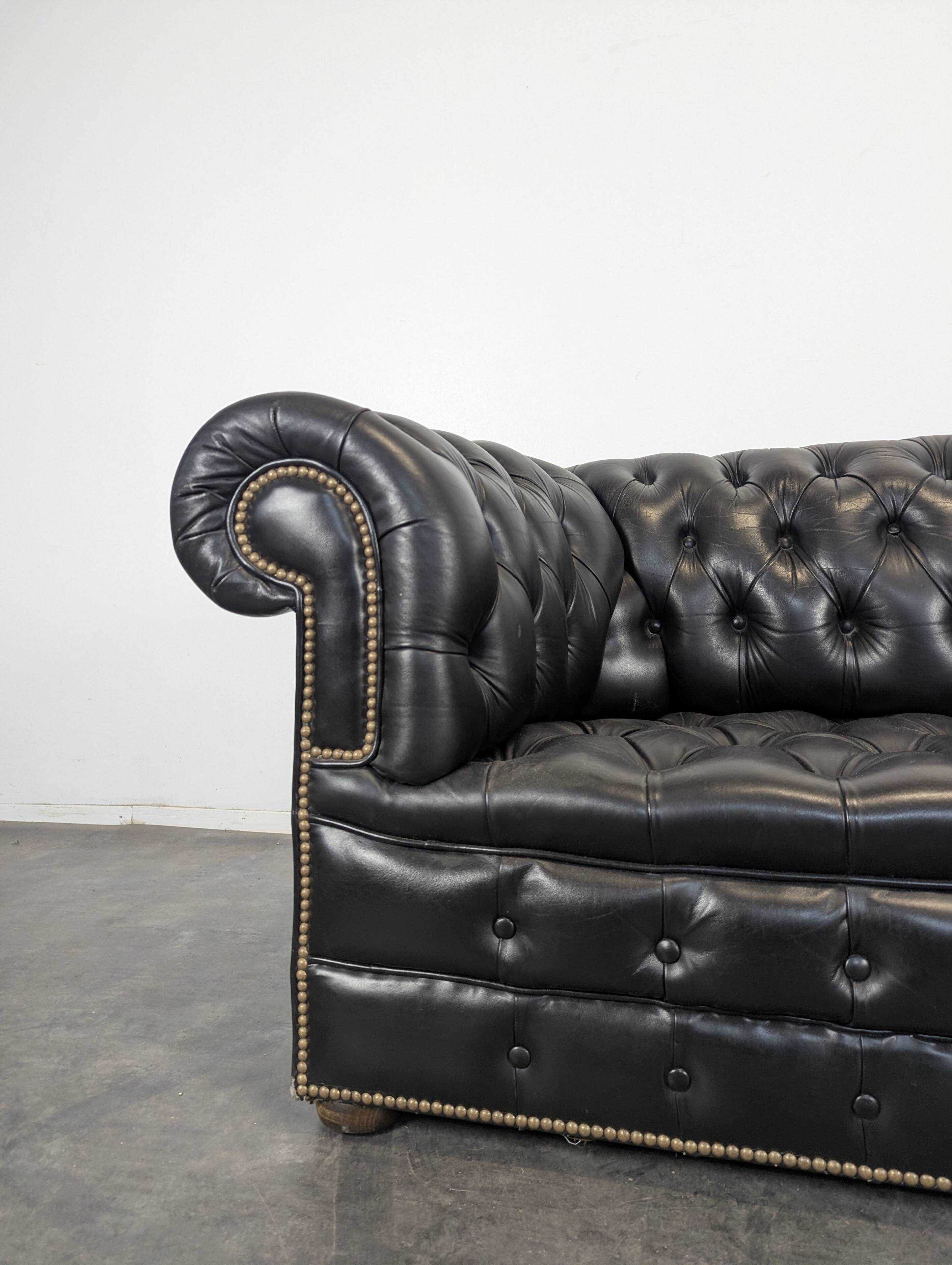 Black Chesterfield sofa for 4 people