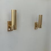 Pair of vintage adjustable brass wall lights, France 1970.