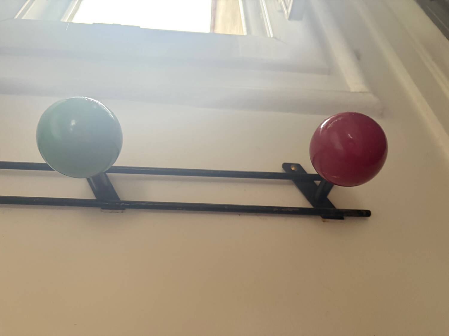 Retro coat rack with 3 red and green balls