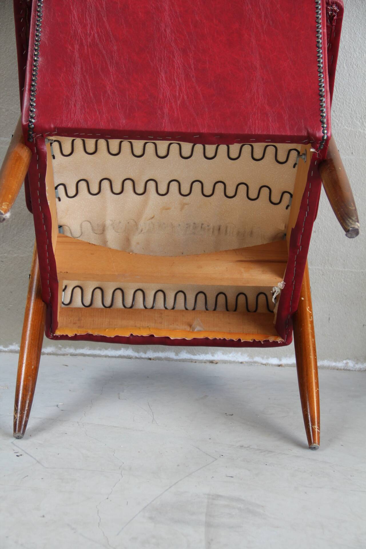 Fauteuil vintage en skaï rouge
