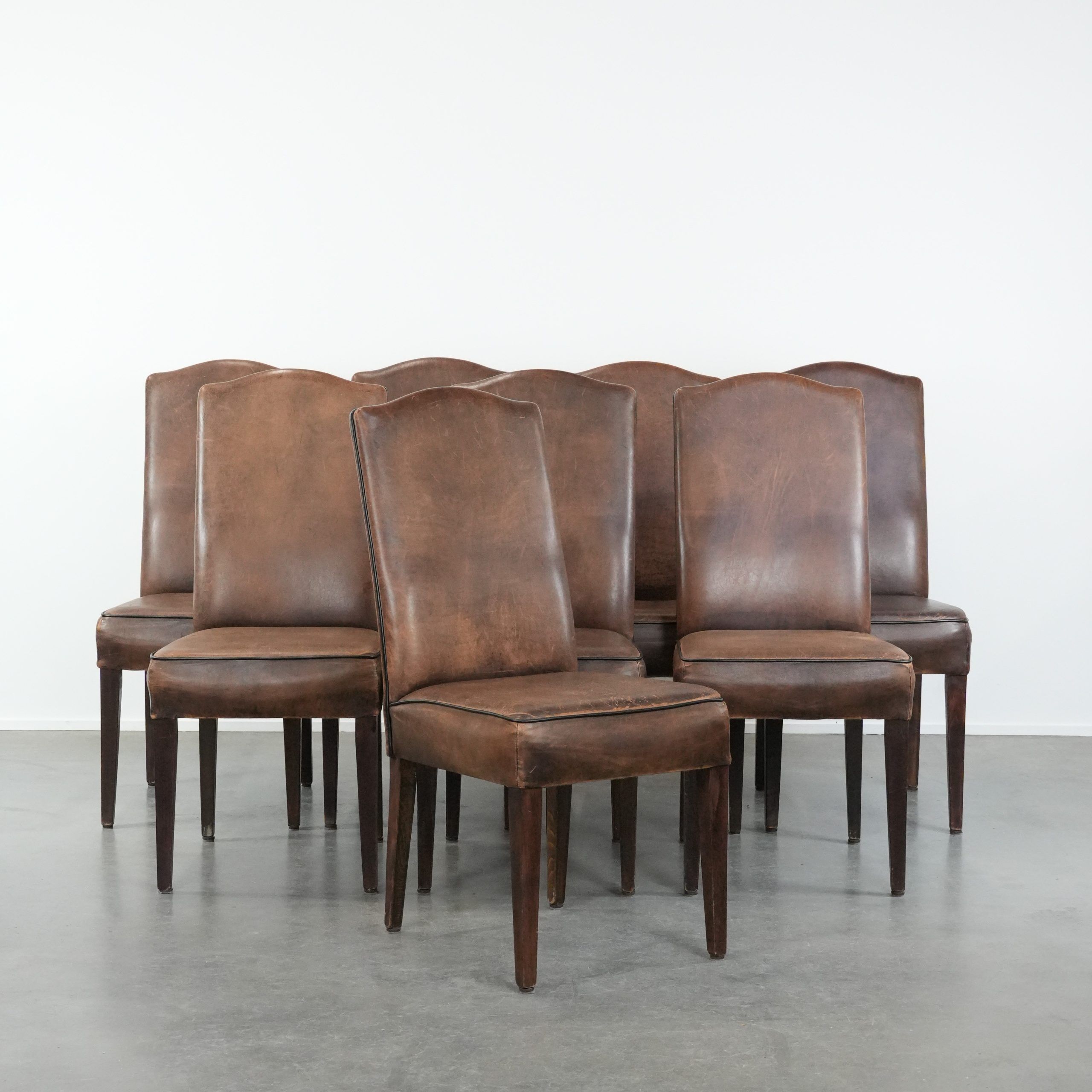 Great set of 8 stylish vintage sheepskin dining chairs with character