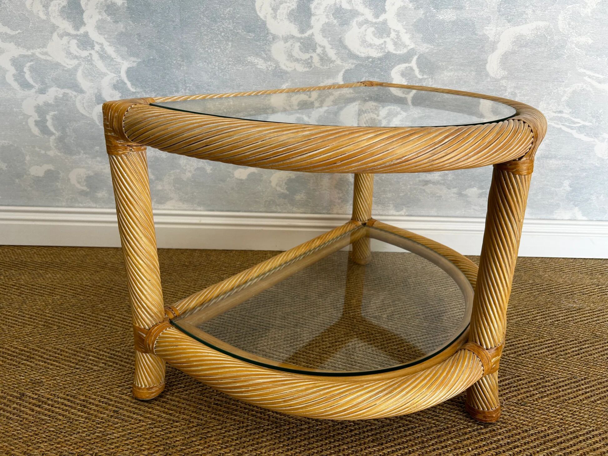 Two-tiered twisted rattan accent table with glass shelves, 1970s