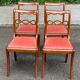 4 dining chairs made of solid wood and pink velvet fabric from the 1950s.