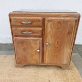 Vintage wooden buffet with a marble top.