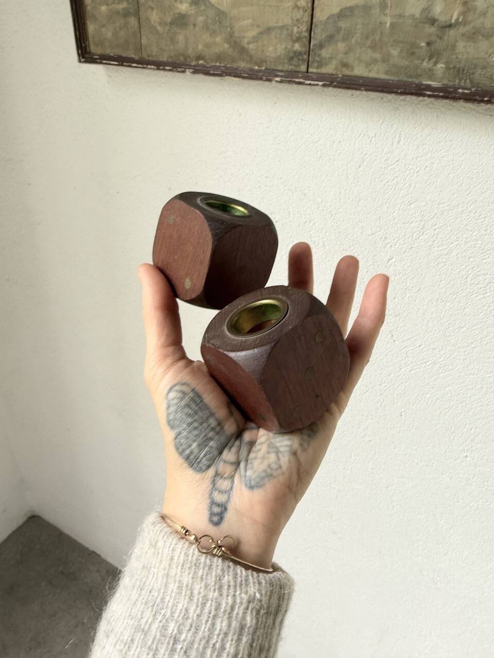 Pair of 1960s teak and brass "dice" candlesticks