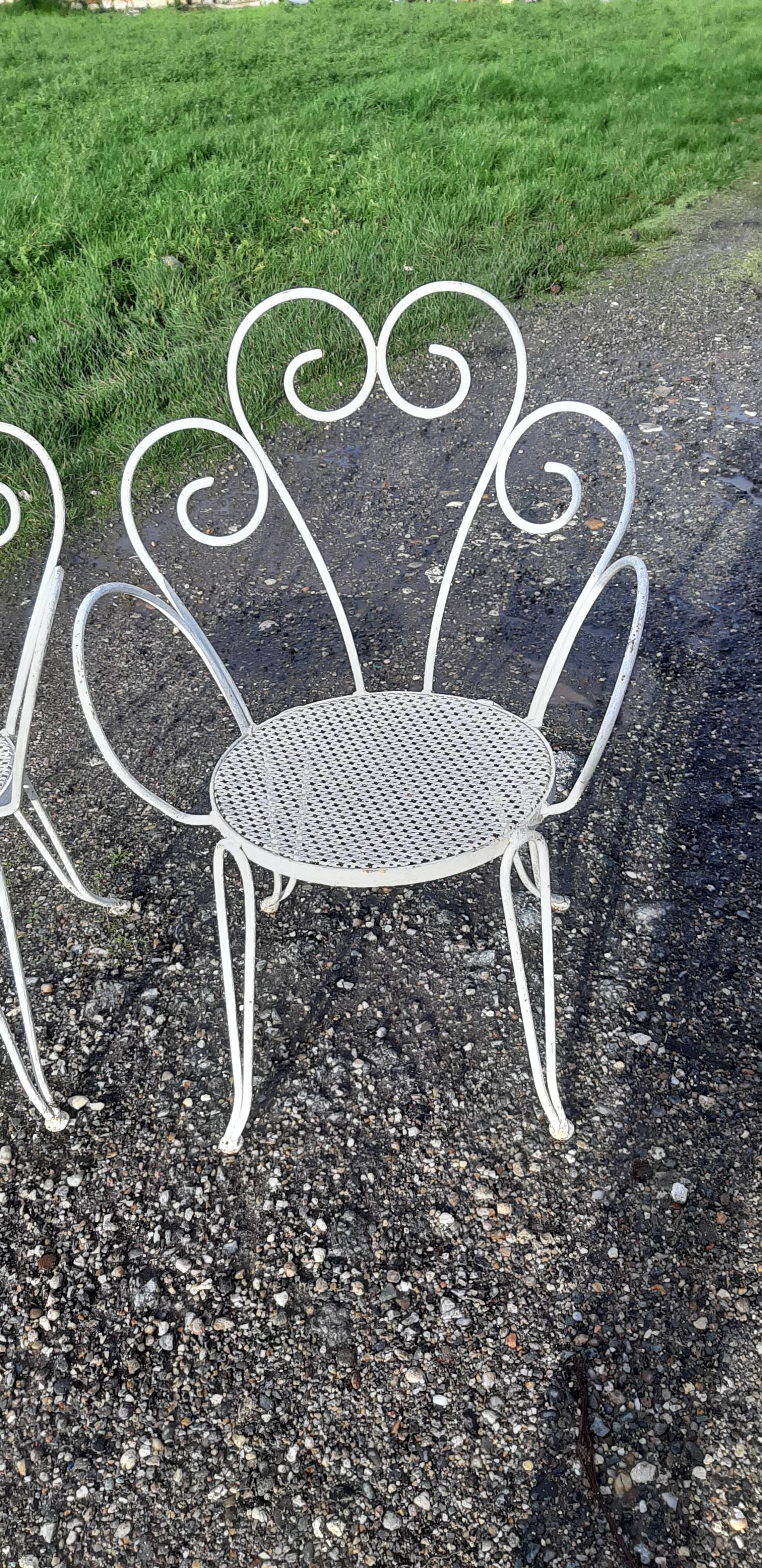 Paire de fauteuils de jardin 1900 en fer forgé