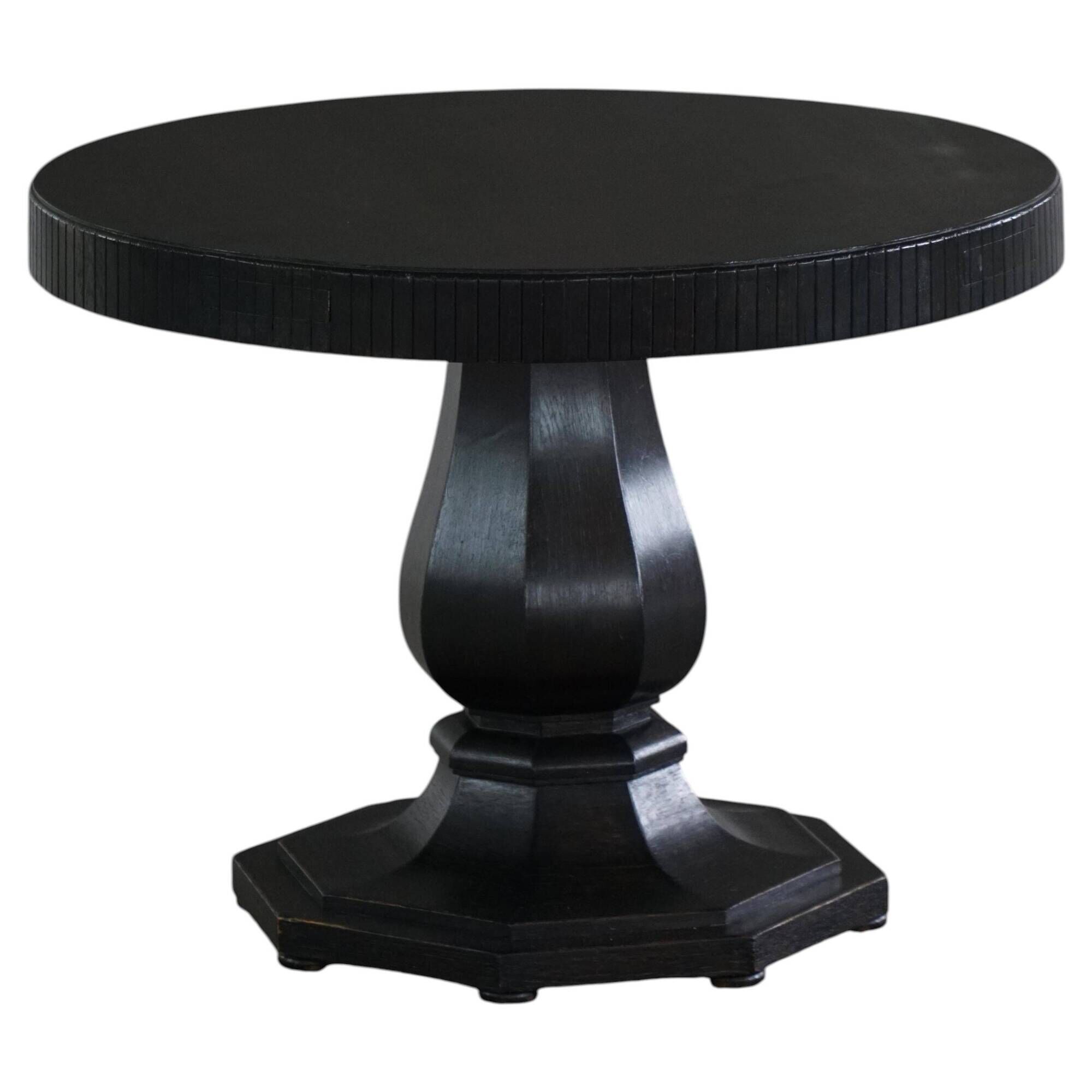 Dining table / round console in Danish Art Deco style in blackened oak, early 20th century.