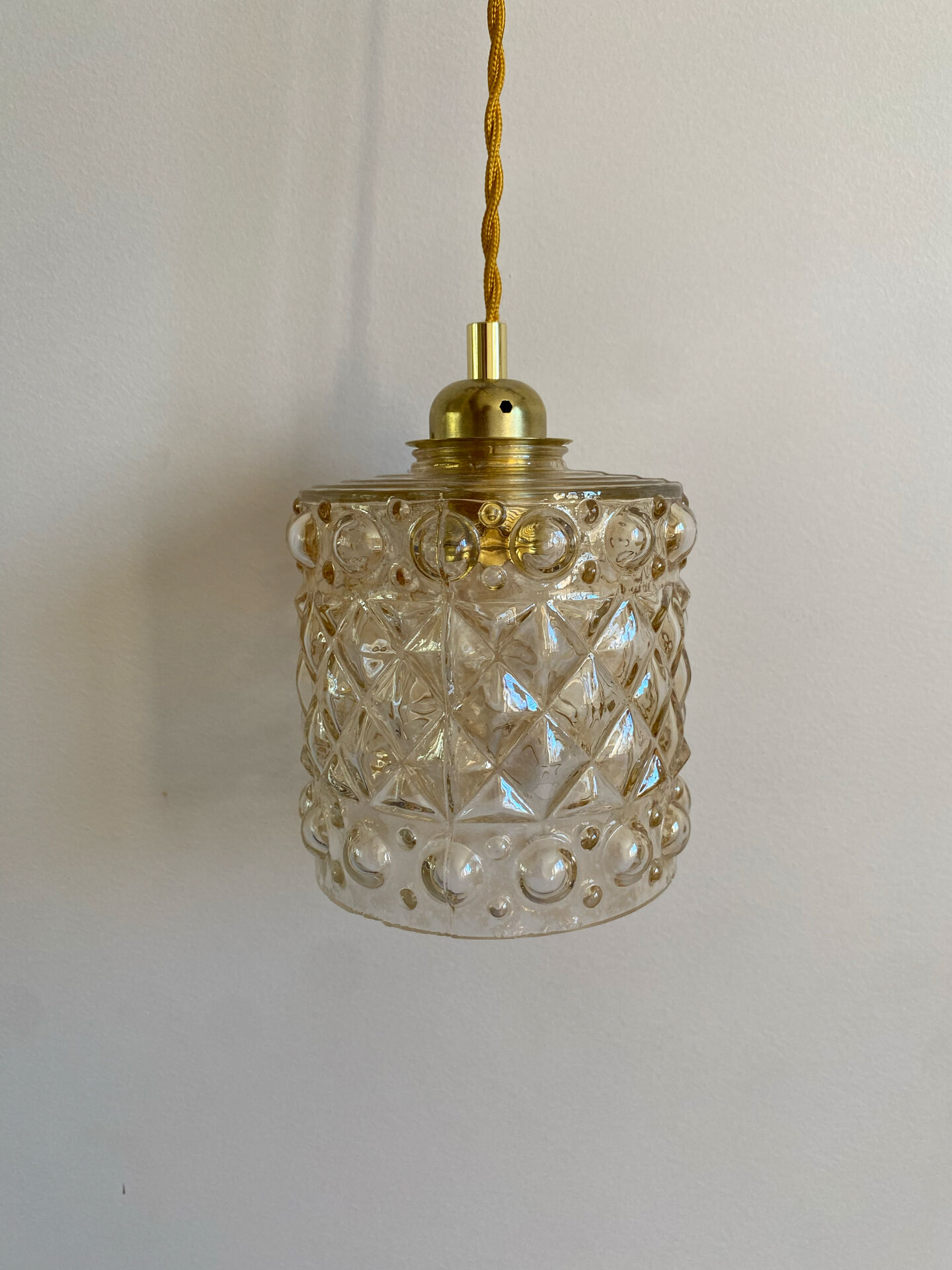 Vintage amber glass suspension globe