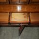 Vintage walnut burr buffet with glass and lighting, Art Deco style.