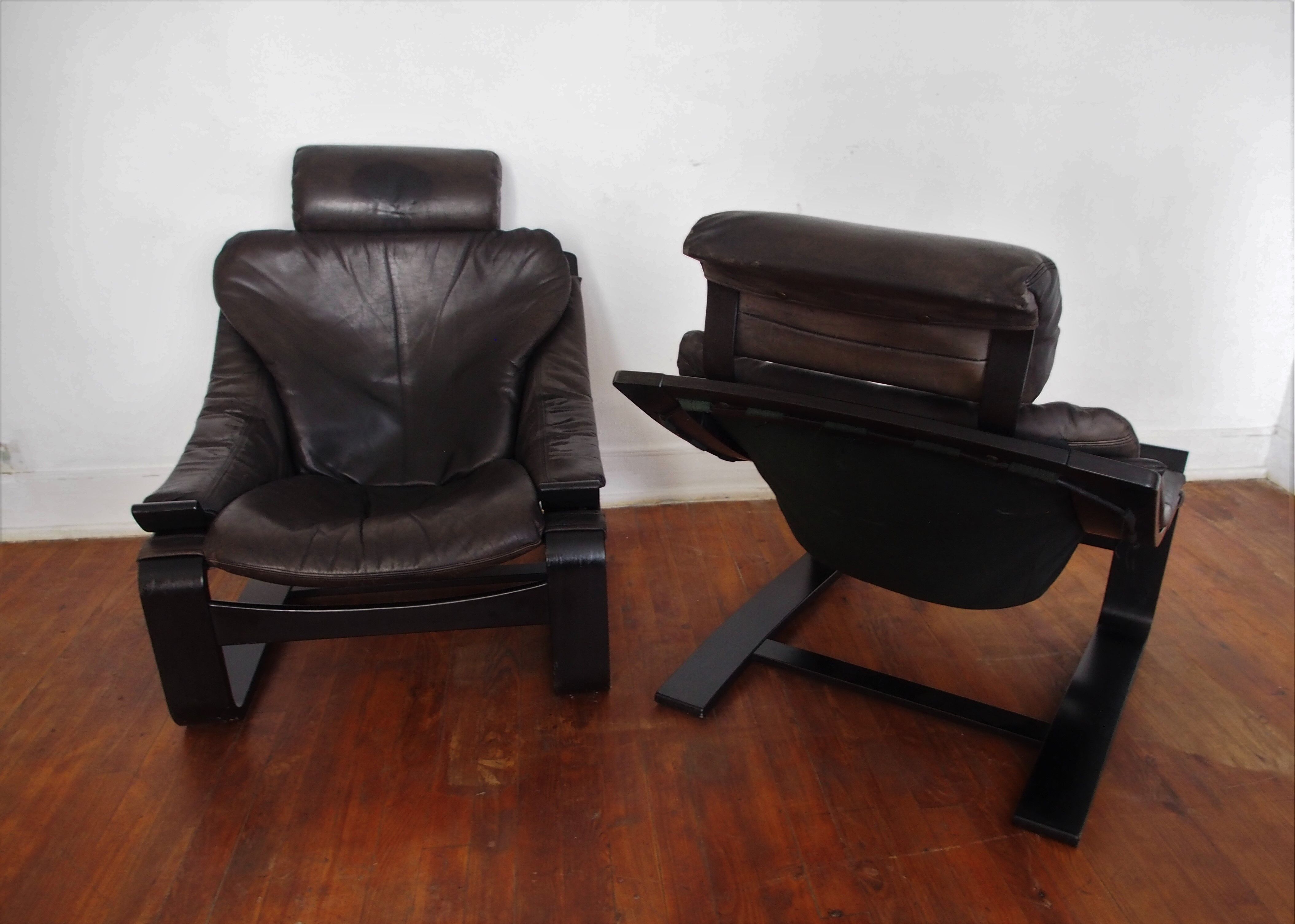 Pair of Scandinavian armchairs and footrests