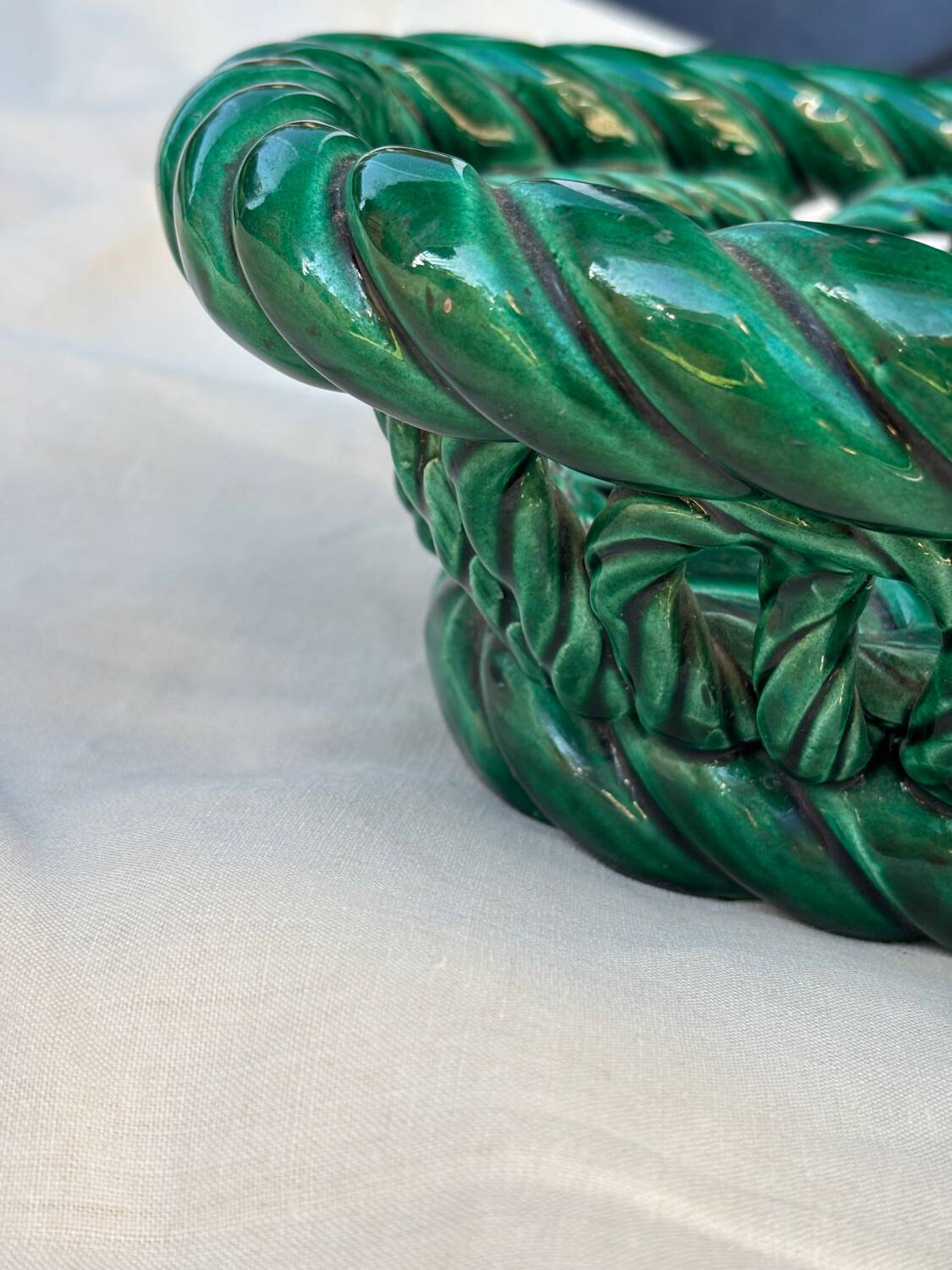 Green woven ceramic basket