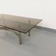 Vintage coffee table in smoked glass and brushed cast aluminum from the 70s