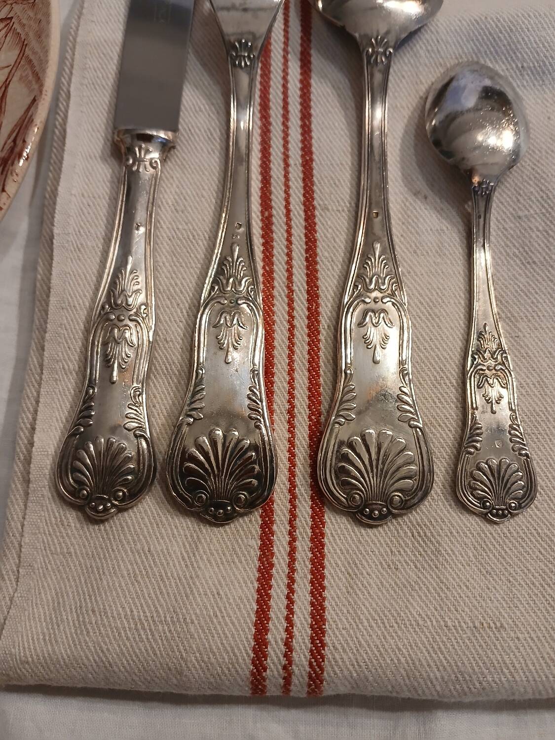 Antique flatware set for 51 place settings