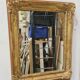 Antique gilded mirror, 19th century Empire style.