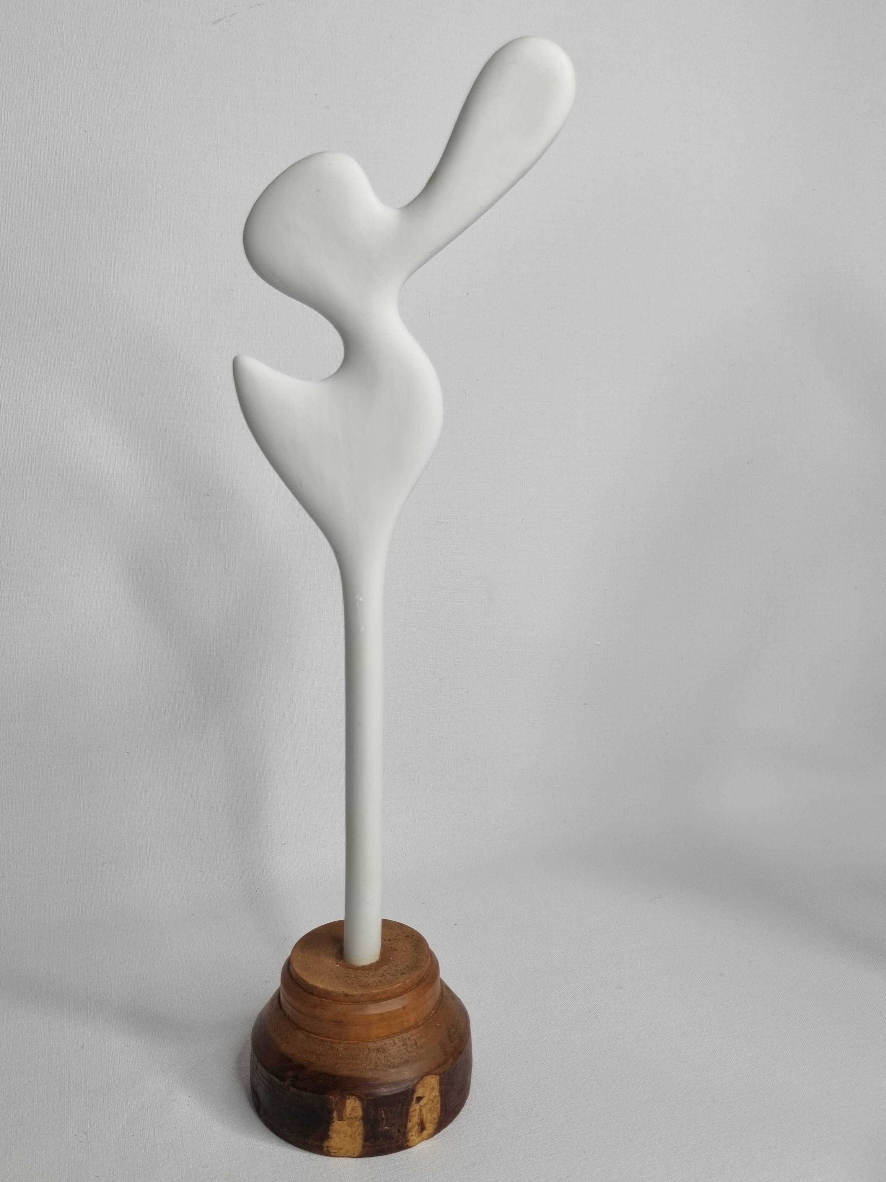 Biomorphic bisque sculpture, on turned wooden base, 37 cm