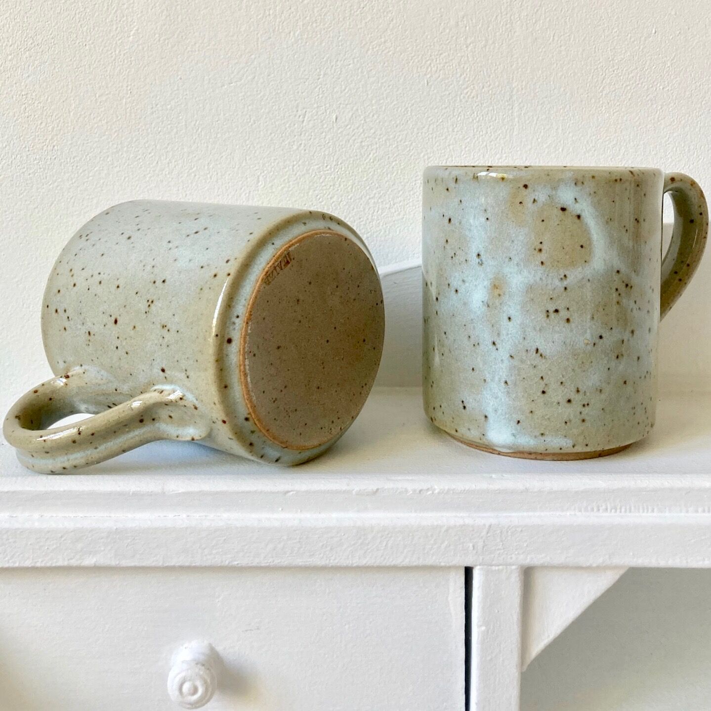 Pair of enamelled stoneware mugs