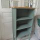 Small vintage bookcase enhanced in smoky green