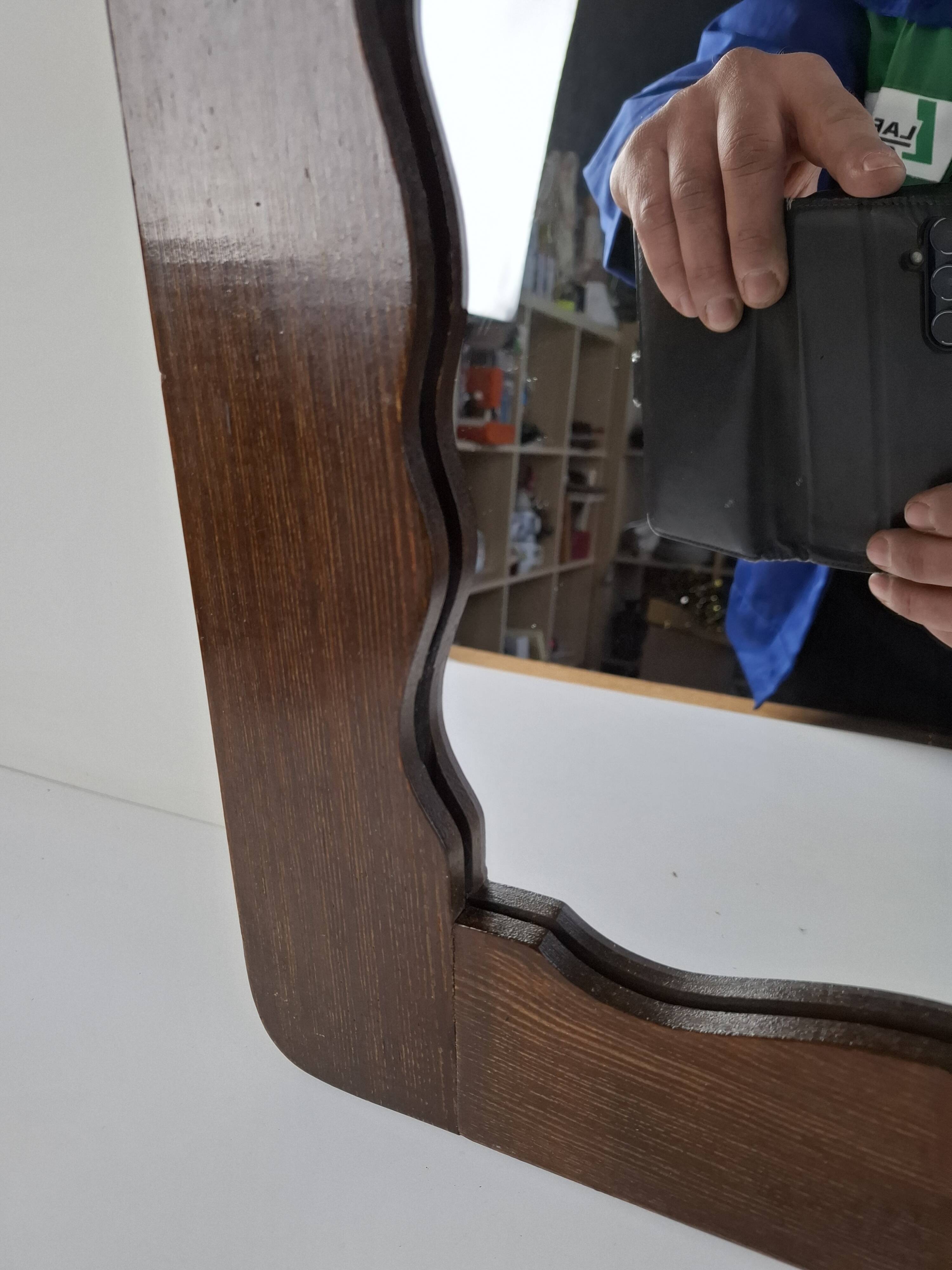 Czechoslovakian wall mirror with a wavy wooden frame, mid-century, 1940s