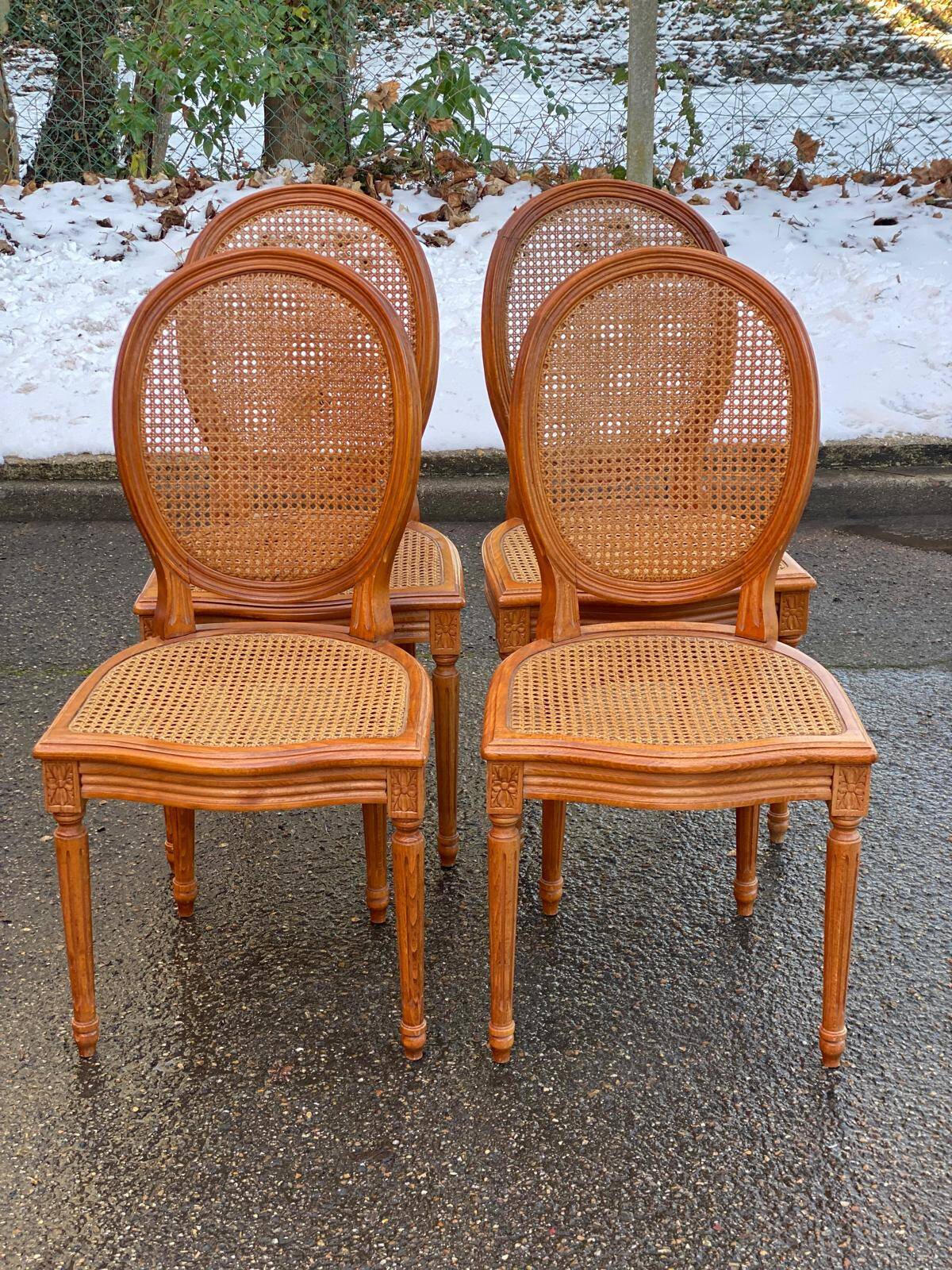 4 caned Louis XVI medallion dining chairs from the 19th century.