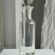 Small ribbed glass carafe, large round cap