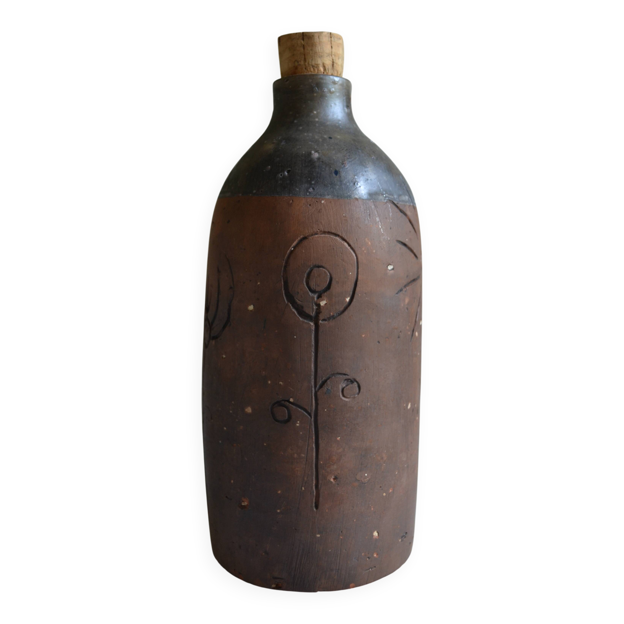 Bottle vase decorative flowers ceramic signature with fish to identify.