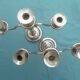 Pair of silver-colored metal candlesticks