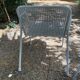 Perforated metal armchairs