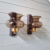 Pair of wall sconces in brass and smoked glass, 1960s.