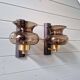 Pair of wall sconces in brass and smoked glass, 1960s.