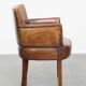 Amazing cognac-coloured sheepskin dining/side chair with armrests