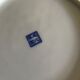 Asian porcelain plates decorated with blue dragons