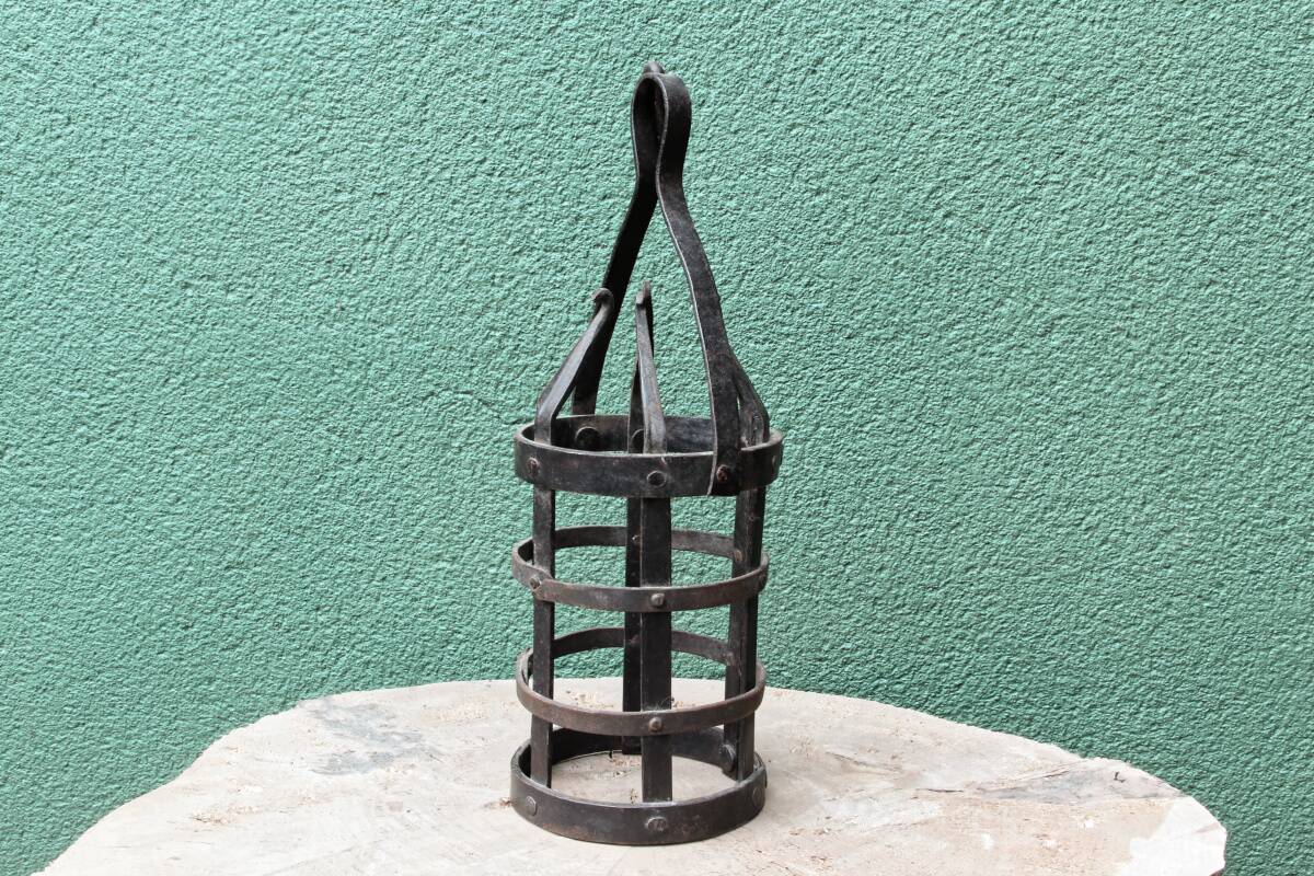 Riveted wrought iron cage suspension