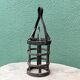 Riveted wrought iron cage suspension