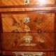 Louis XVI style commode in marquetry from around 1940.