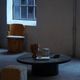 Round brutalist coffee table in stone and steel, mid-century French modernism, 1970s.