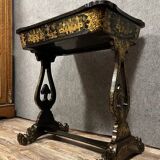 Lacquered work table, blackened wood decorated with Chinese scenes, Napoleon III period circa 1850