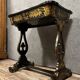 Lacquered work table, blackened wood decorated with Chinese scenes, Napoleon III period circa 1850