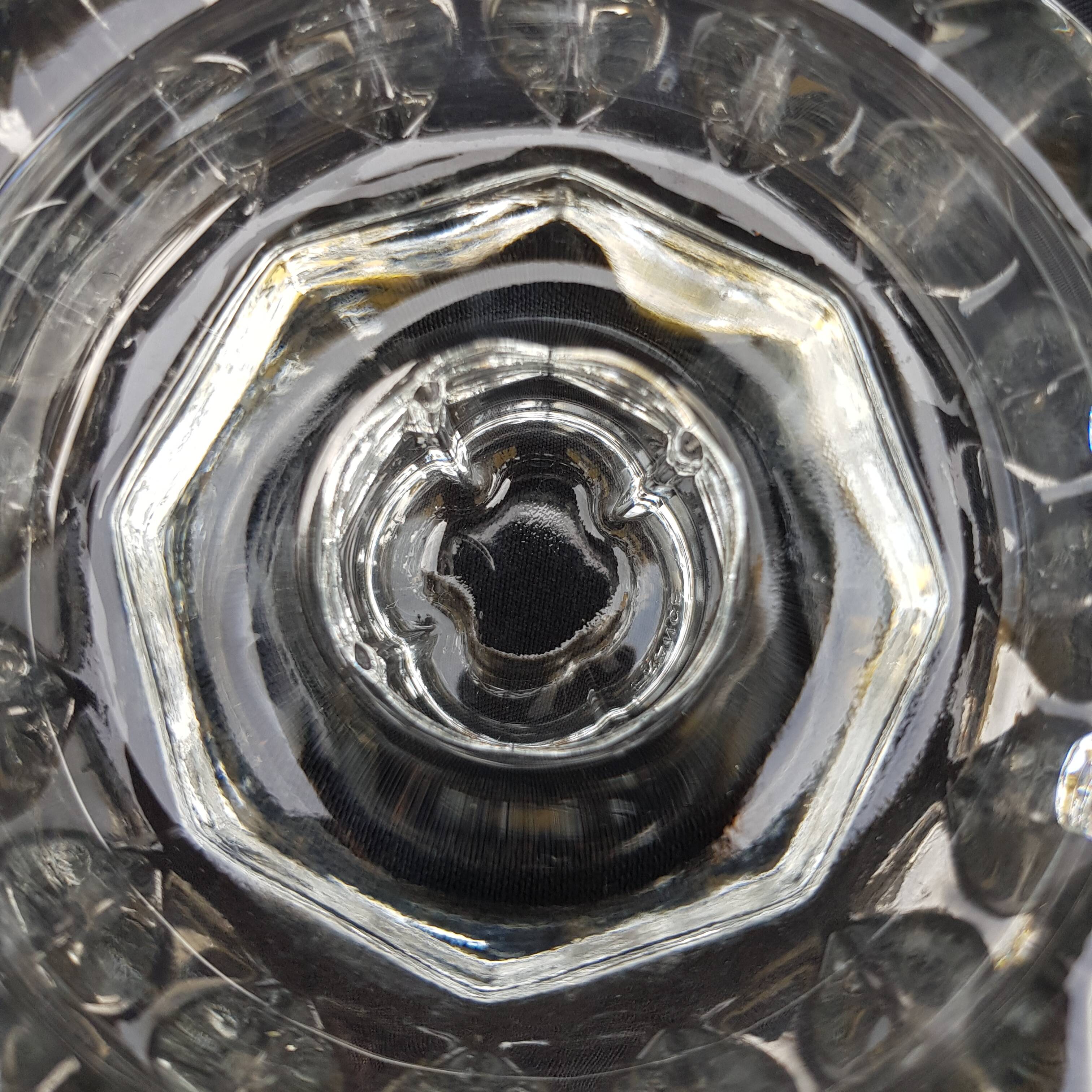 Duo of old glass candlesticks
