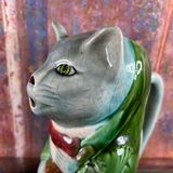 Pitcher slurry cat musician