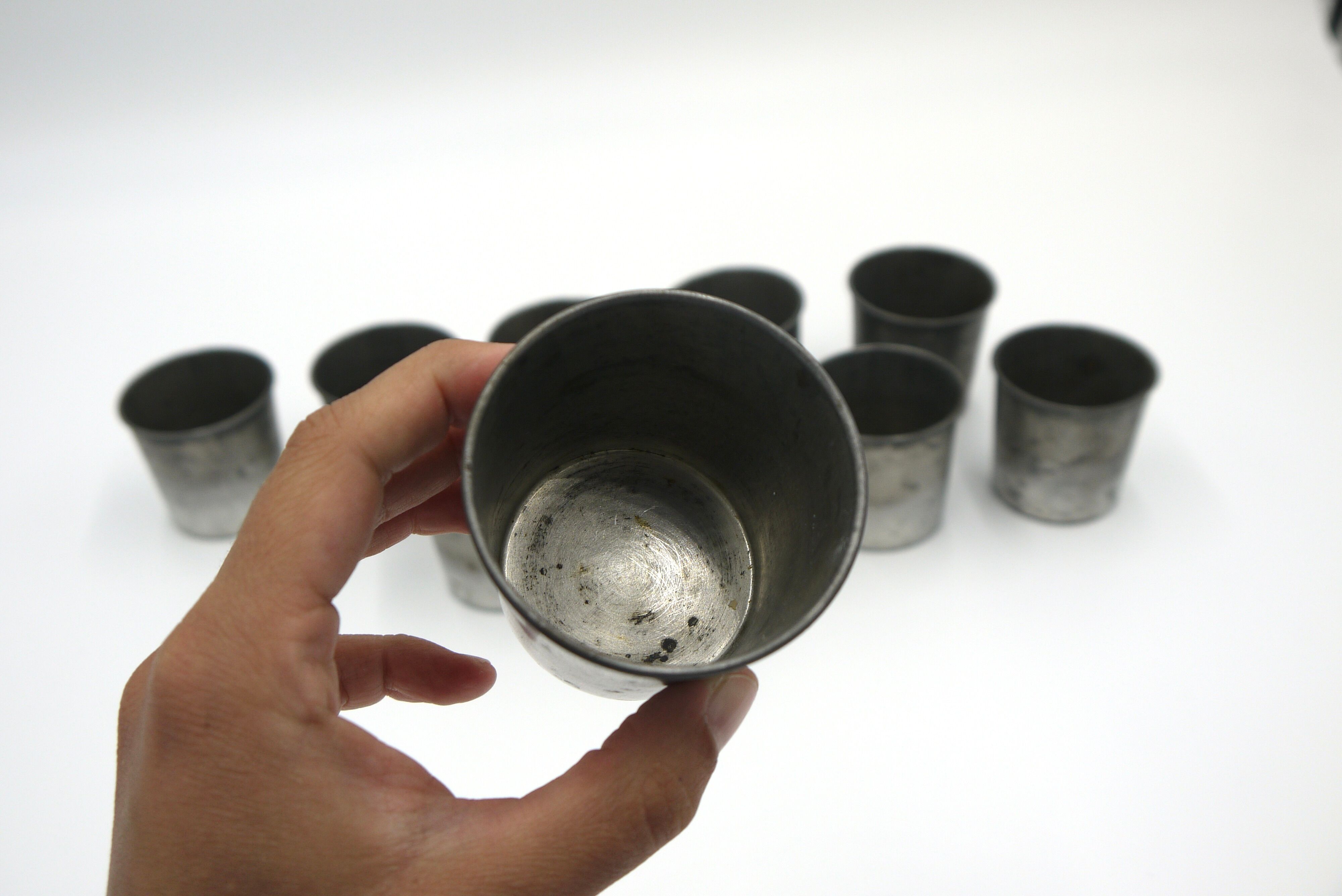 Set of 10 tin cups