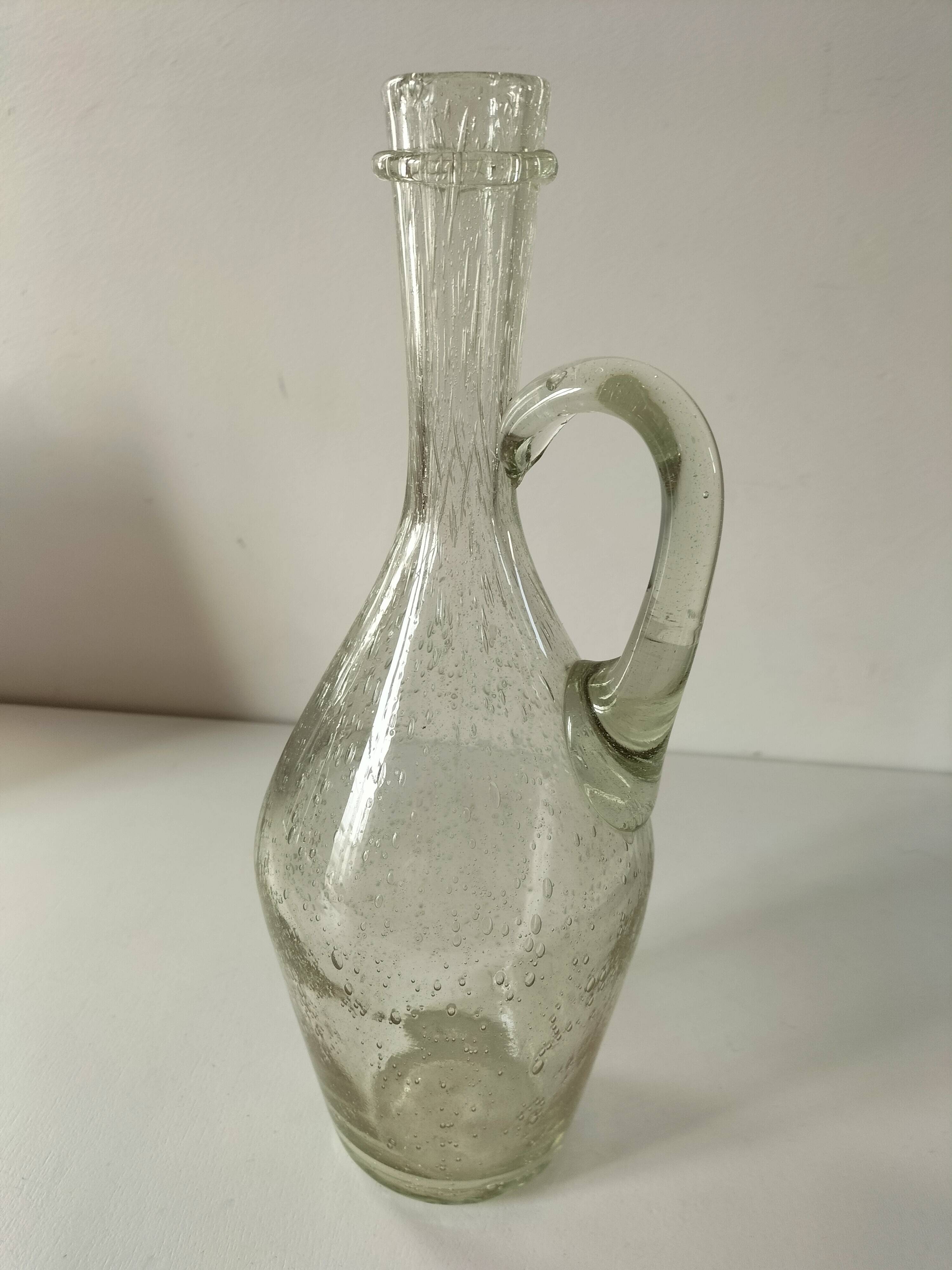 Bubble glass carafe bottle signed Biot in lime green colour.