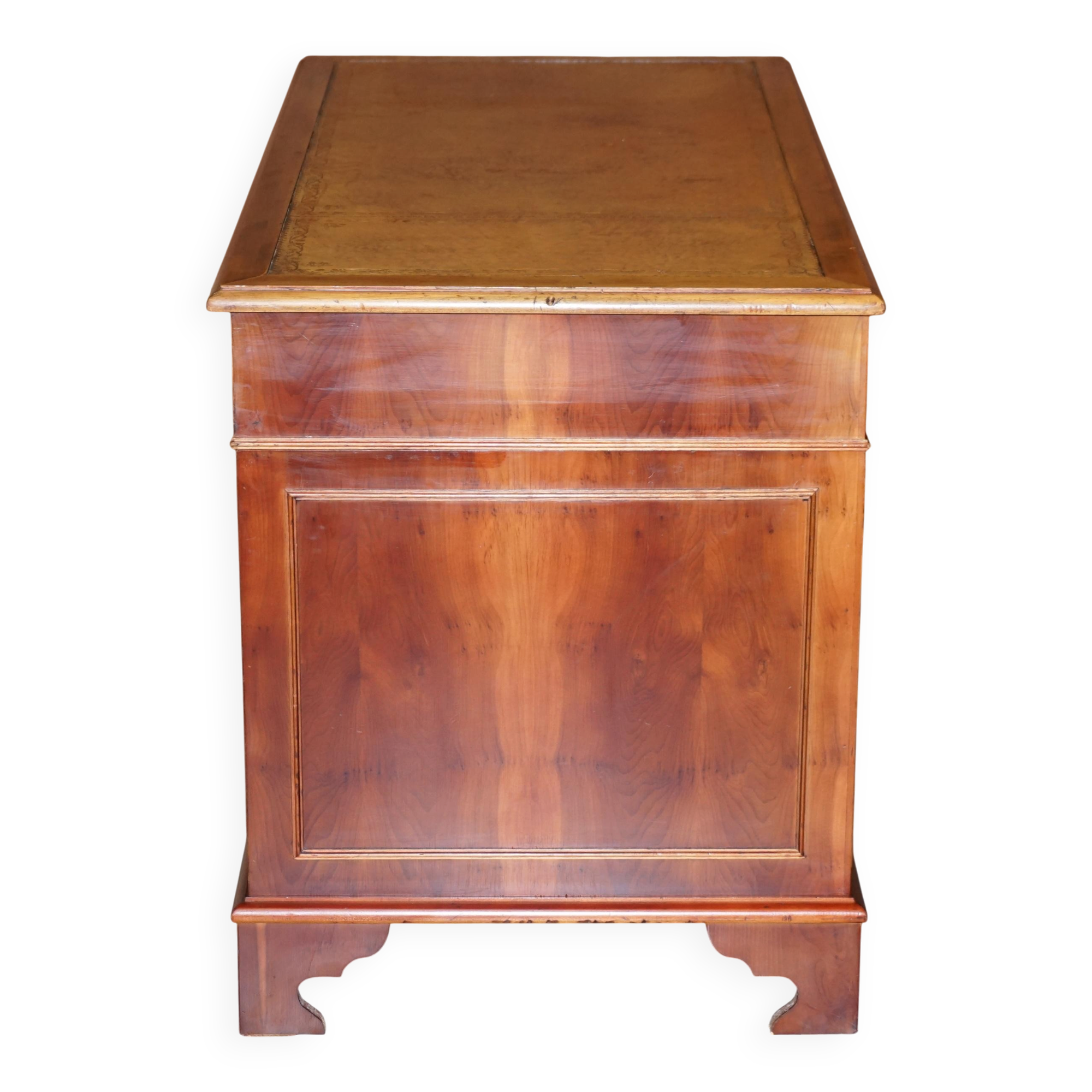 Vintage walnut desk with a leather top and two drawers.