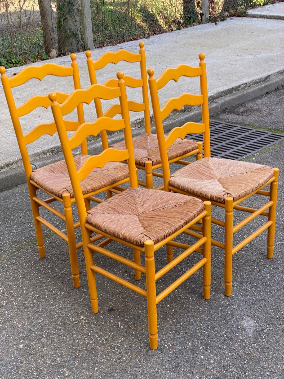 4 solid wood chairs with rush seats from the 1960s.