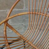 Rattan armchair with metal base from the 1950s