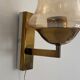 Yellow glass and brass wall light from the mid-century, 1960, Germany.