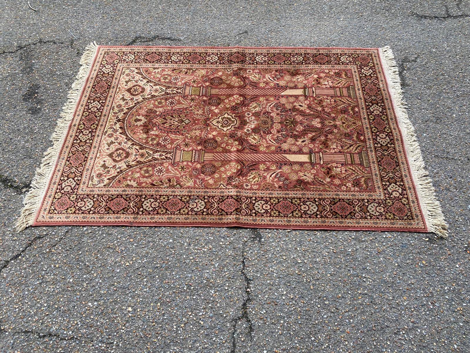 Persian rug in burgundy wool 110x170